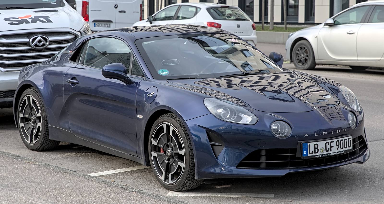Blue Alpine A110 coupe, front three-quarter view, parked in Stuttgart-Vaihingen