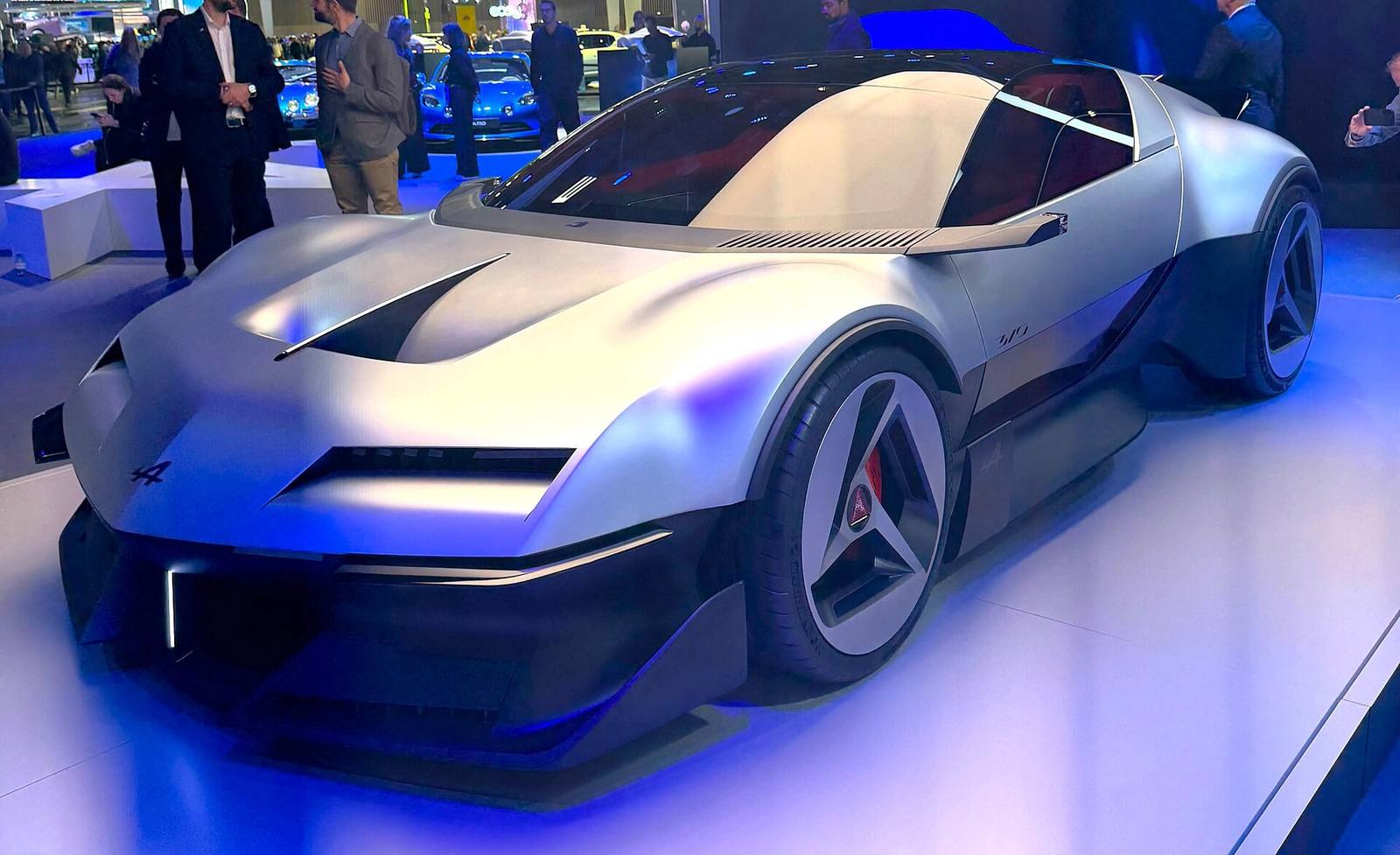 The silver Alpine A310 Vision concept on the Alpine stand at the 2026 Paris Motor Show