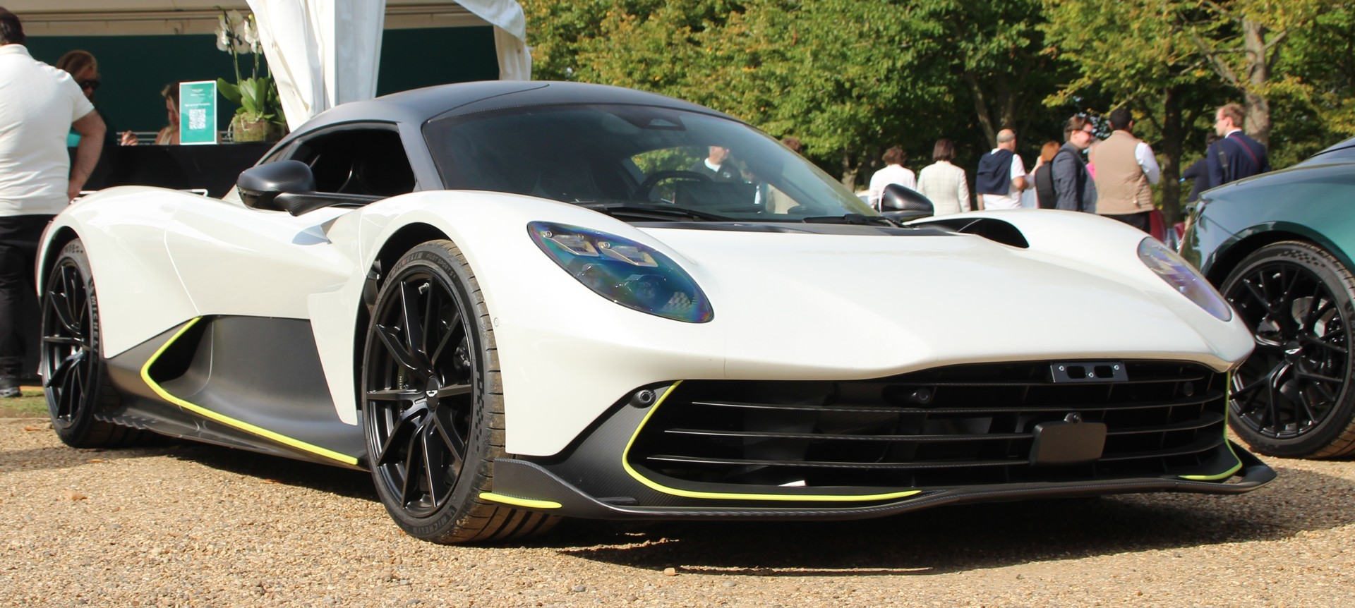 White Aston Martin Valhalla hypercar in front three-quarter view at a 2025 show