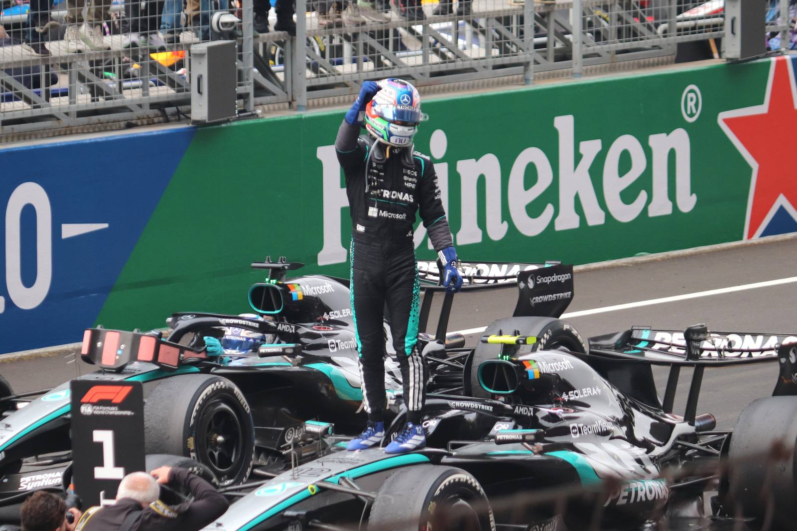 Kimi Antonelli celebrating on his Mercedes after the 2026 Chinese Grand Prix