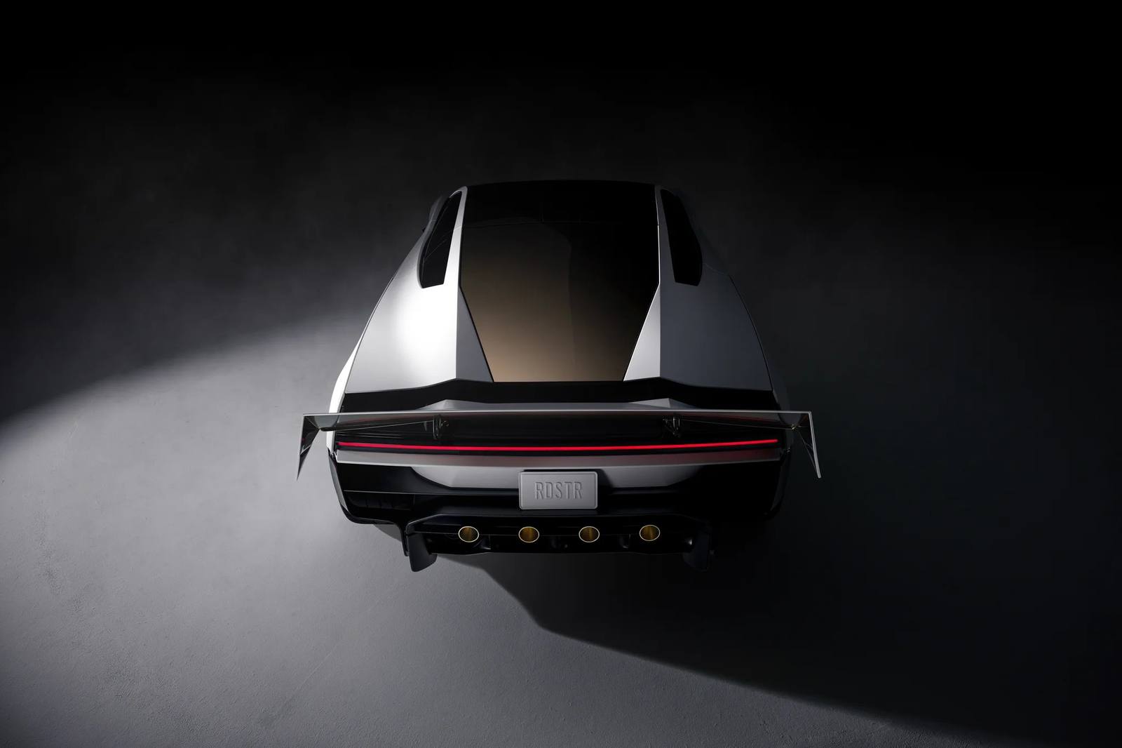 Tesla Roadster from rear above, showing light bar and thruster nozzles